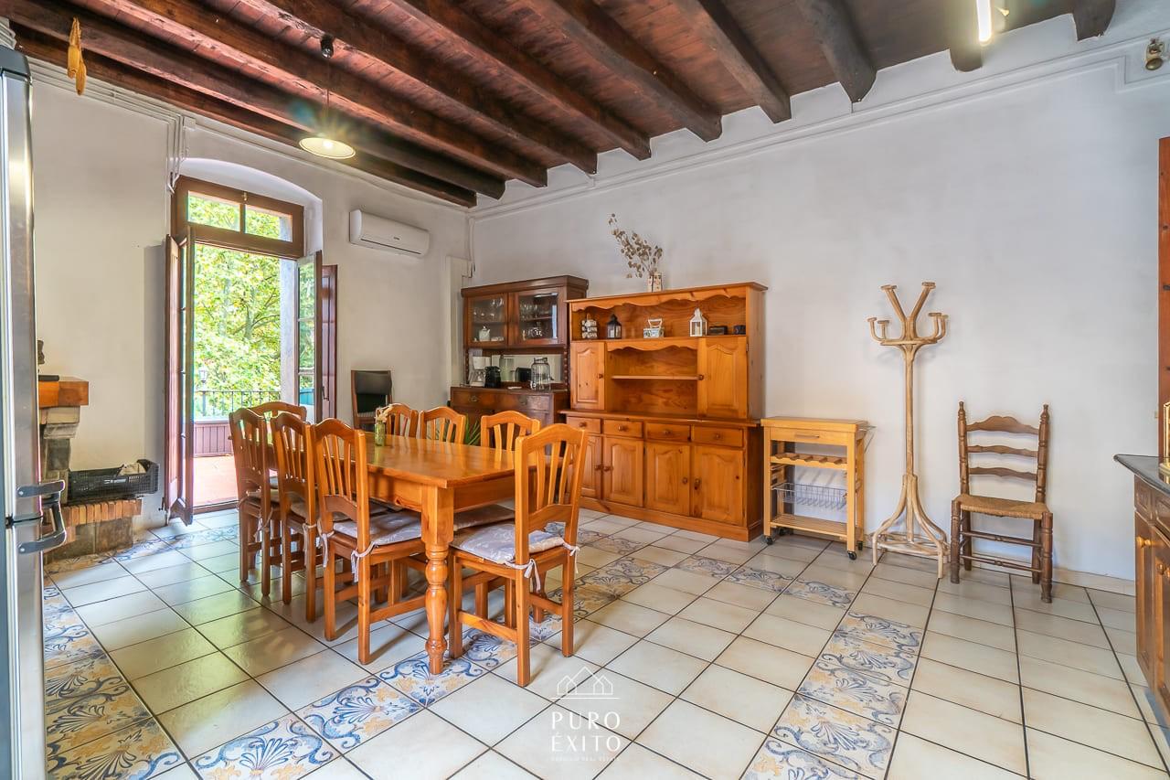 Dining room with dresser and balcony doors